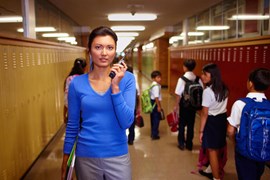 Walkie talkie being used in a school